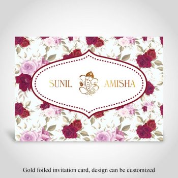 Hindu wedding card design with floral background and gold foiled Ganeshji and names of couple