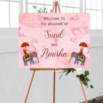 Wedding welcome sign with an illustration of couple sitting on elephants