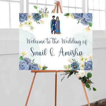 Floral wedding welcome board with Indian couple illustration
