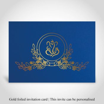 Blue hindu wedding invitation with floral design and Ganeshi, Gold foiled Indian invitation on blue cardstock.