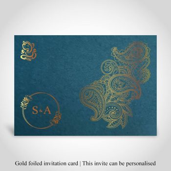 Teal Hindu wedding invite, ganeshji, paisley design and couples initials all foiled in gold.
