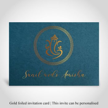 Gold foiled Hindu wedding invitation with Ganesh and names of couple on teal cardstock